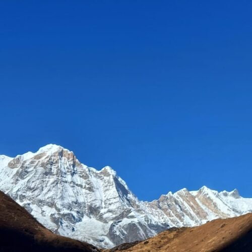 The Annapurna Base Camp (ABC) trek is one of Nepal’s premier, classic trekking routes, taking hikers into the heart of the Annapurna Massif at an altitude of 4,130 meters (13,550 feet). Surrounded by high peaks, including Annapurna I (8,091m), the 10th highest mountain in the world, the camp sits within a natural amphitheater known as the Annapurna Sanctuary.