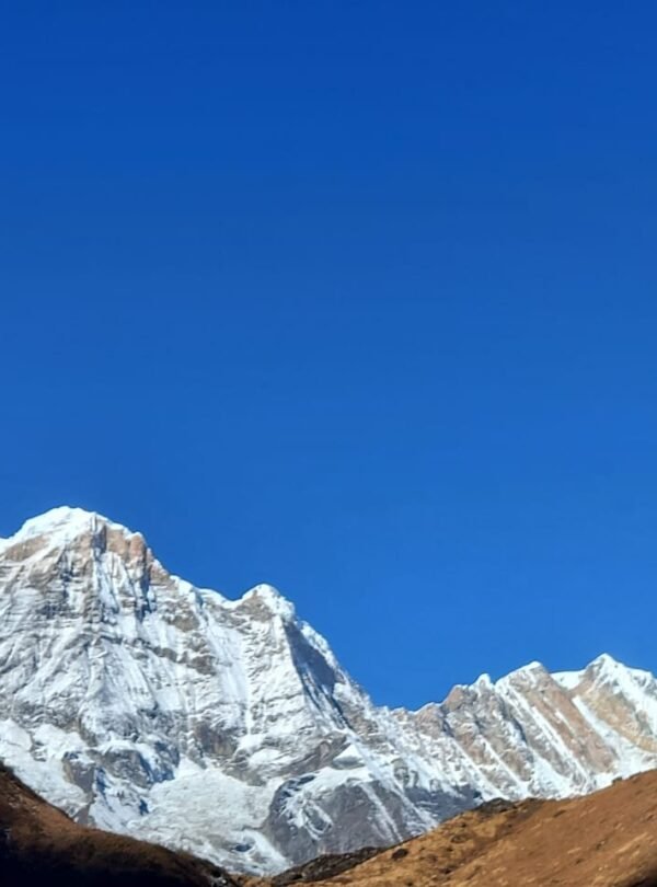 The Annapurna Base Camp (ABC) trek is one of Nepal’s premier, classic trekking routes, taking hikers into the heart of the Annapurna Massif at an altitude of 4,130 meters (13,550 feet). Surrounded by high peaks, including Annapurna I (8,091m), the 10th highest mountain in the world, the camp sits within a natural amphitheater known as the Annapurna Sanctuary.