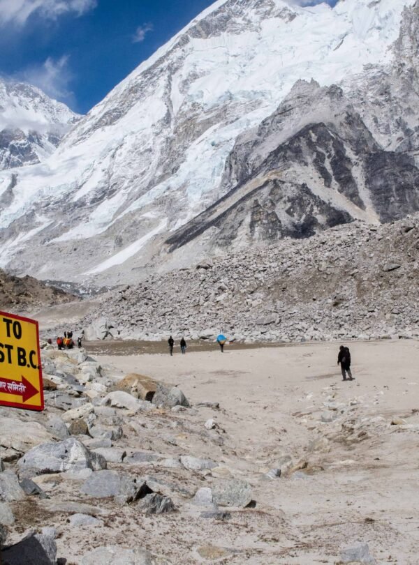 Way to Lobuche signboard with stunning views of snow-capped Himalayan peaks and glacier landscape on the Everest Base Camp trekking route in Nepal.”