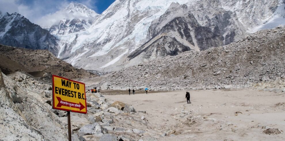 Way to Lobuche signboard with stunning views of snow-capped Himalayan peaks and glacier landscape on the Everest Base Camp trekking route in Nepal.”